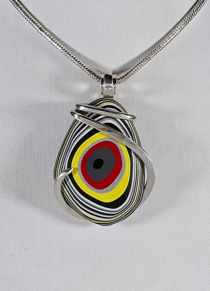 Fordite Handmade Stone Pendant Wrapped in Silver