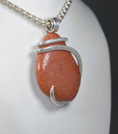 Goldstone Handmade Stone Pendant Wrapped in Silver