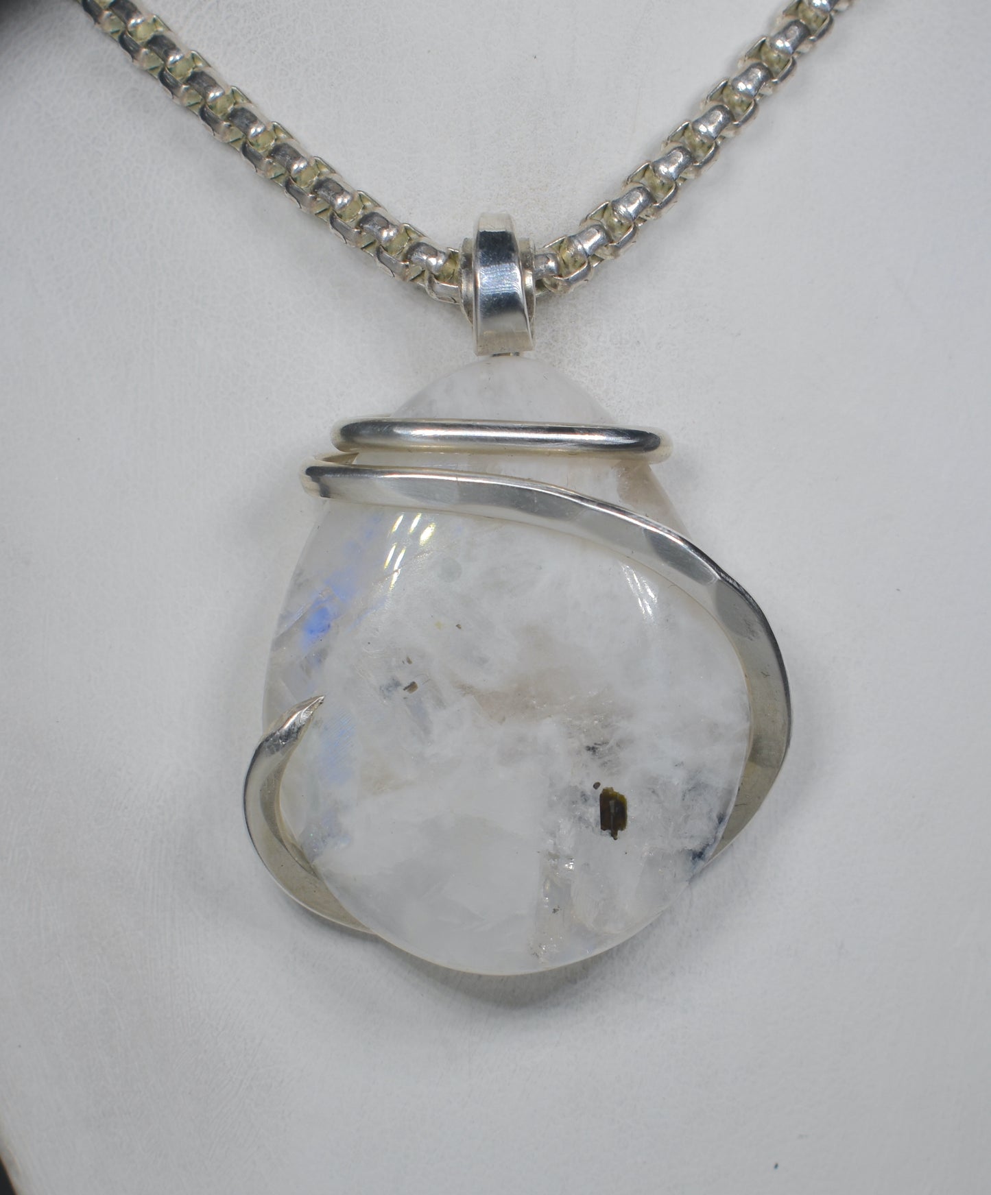 Spectrolite Handmade Crystal Pendant Wrapped in Silver