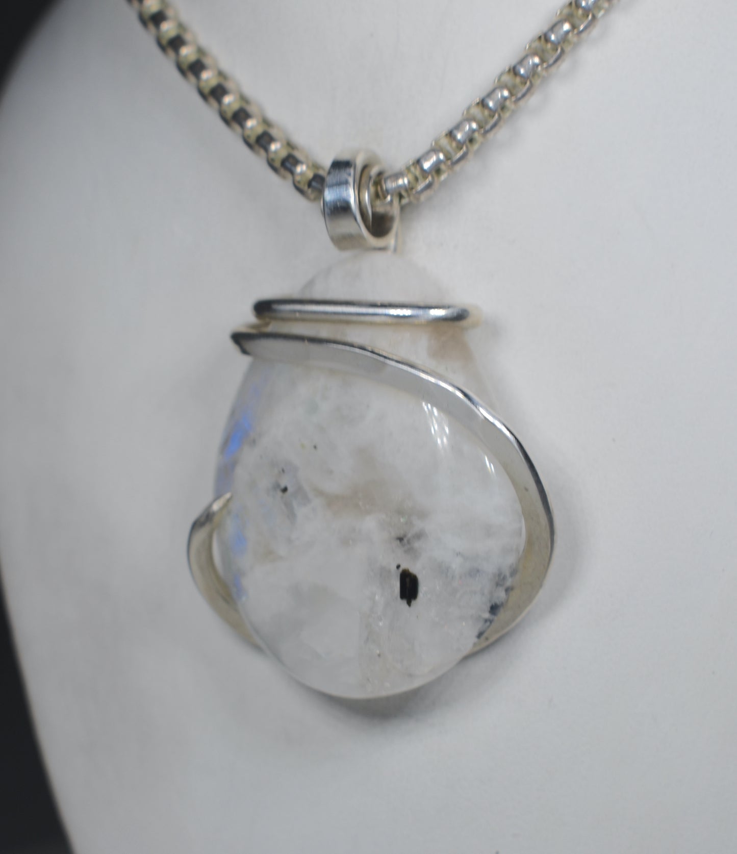 Spectrolite Handmade Crystal Pendant Wrapped in Silver