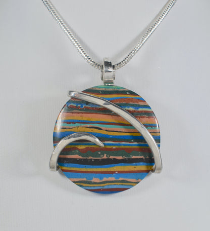 Fordite Handmade Stone Pendant Wrapped in Silver