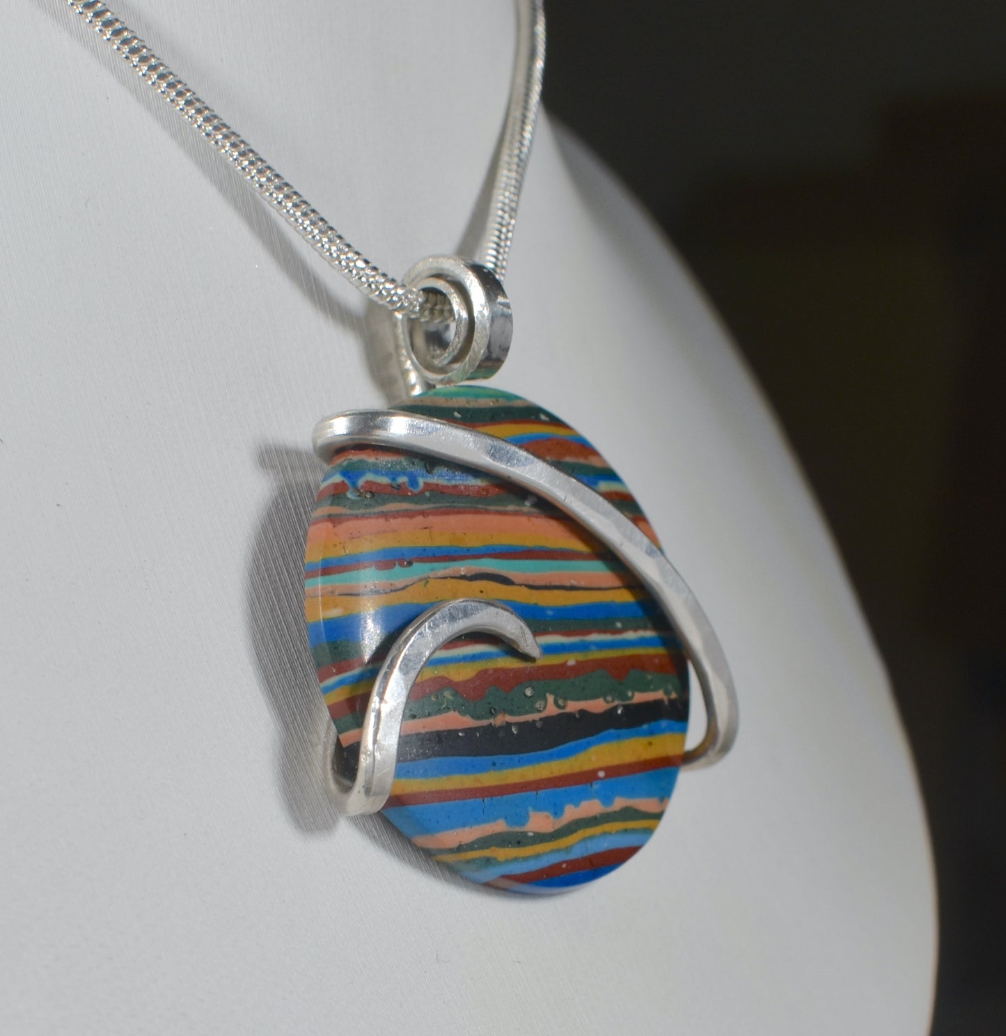 Fordite Handmade Stone Pendant Wrapped in Silver