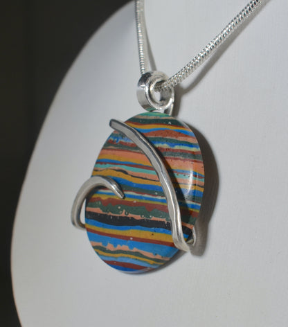 Fordite Handmade Stone Pendant Wrapped in Silver