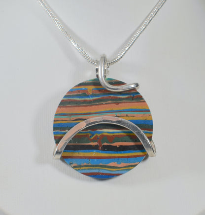 Fordite Handmade Stone Pendant Wrapped in Silver