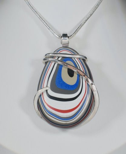 Fordite Handmade Stone Pendant Wrapped in Silver