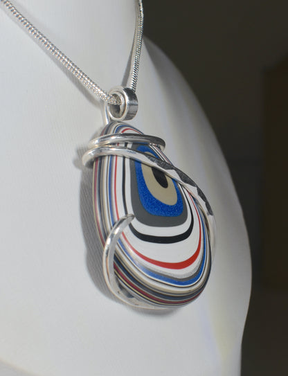 Fordite Handmade Stone Pendant Wrapped in Silver