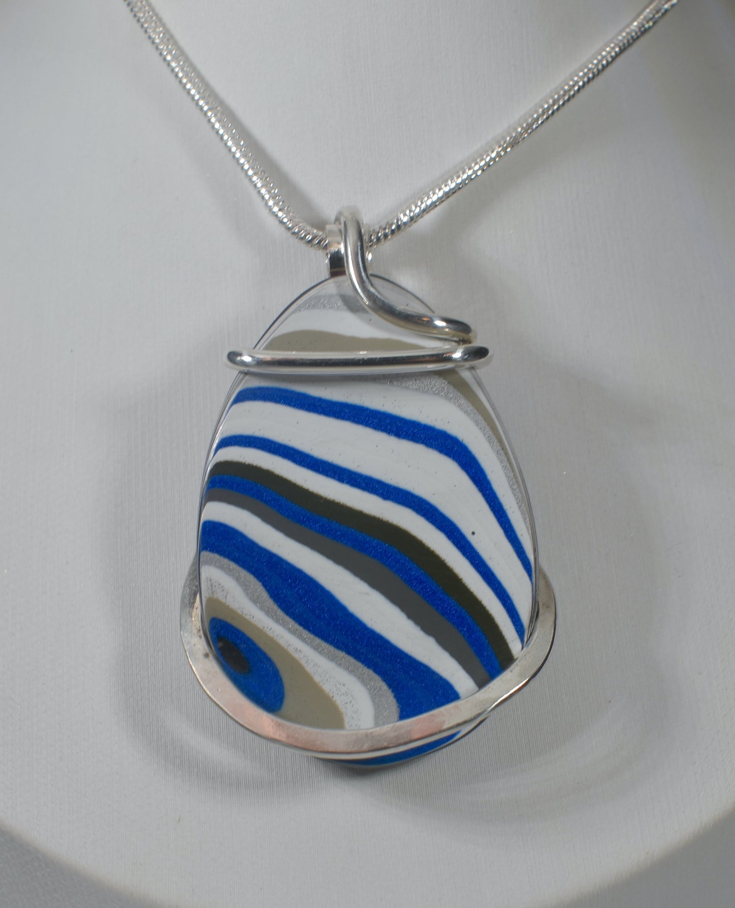 Fordite Handmade Stone Pendant Wrapped in Silver