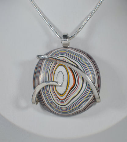 Fordite Handmade Stone Pendant Wrapped in Silver