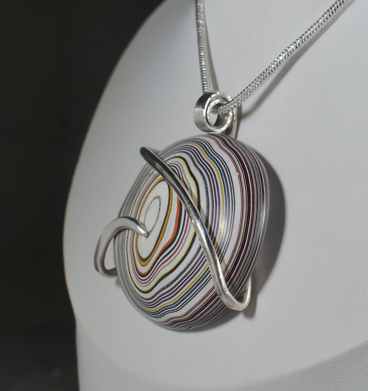 Fordite Handmade Stone Pendant Wrapped in Silver