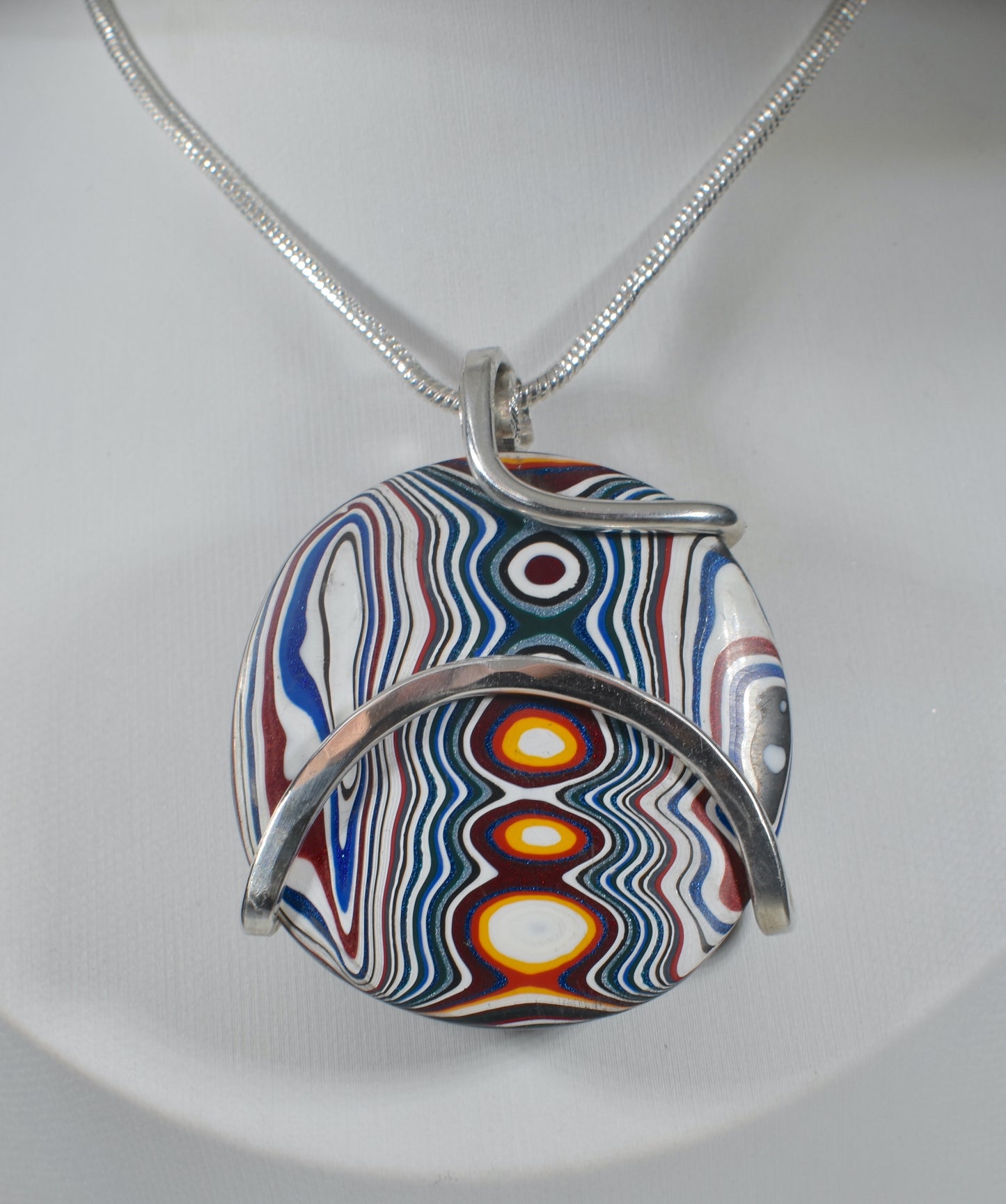 Fordite Handmade Stone Pendant Wrapped in Silver