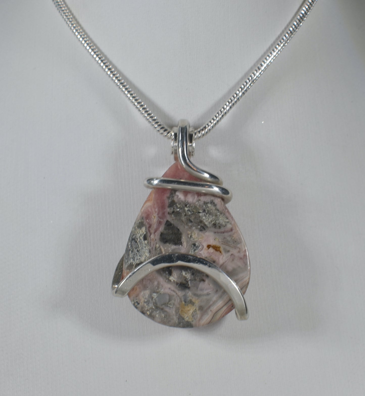 Rhodochrosite Handmade Crystal Pendant Wrapped in Silver