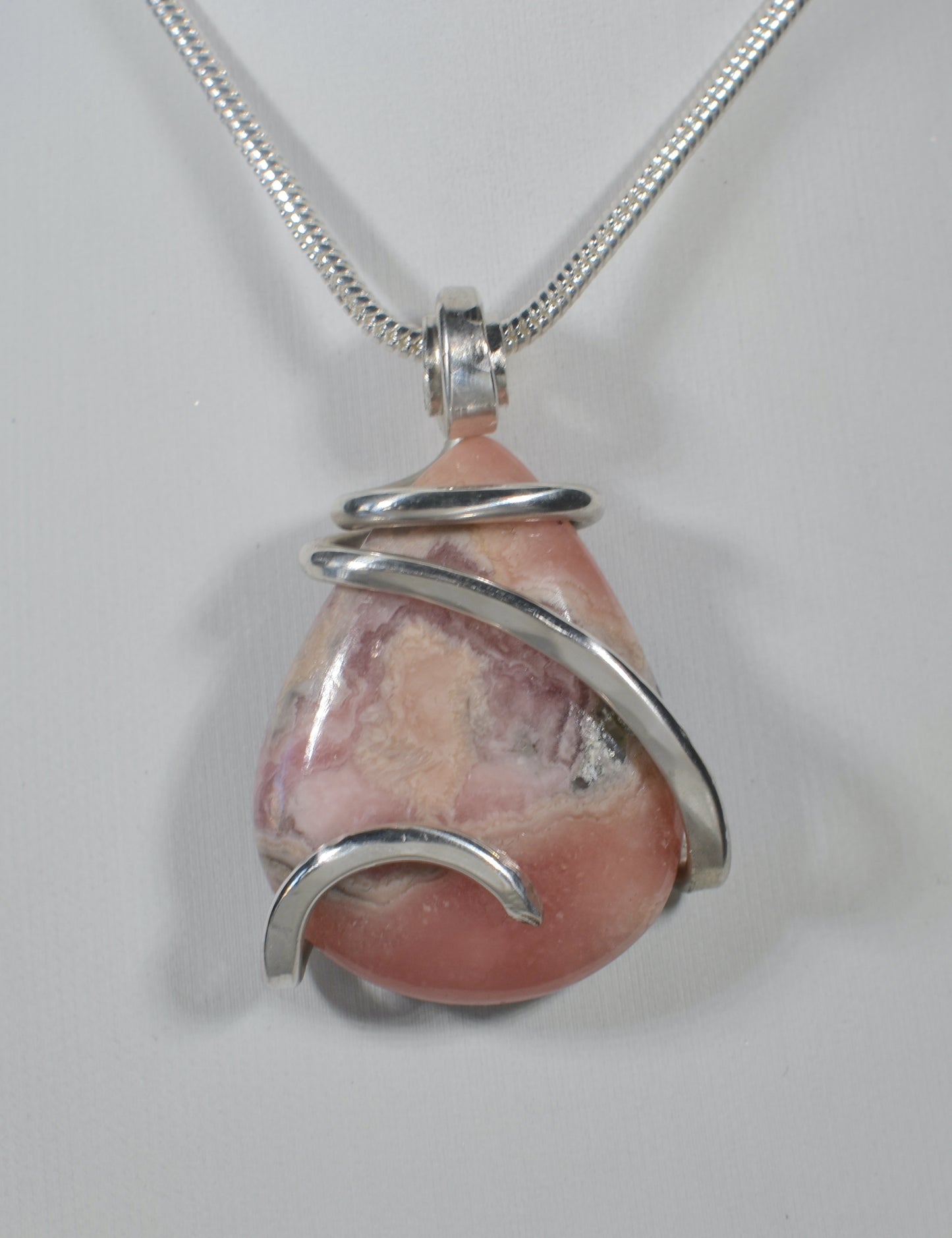 Rhodochrosite Handmade Crystal Pendant Wrapped in Silver