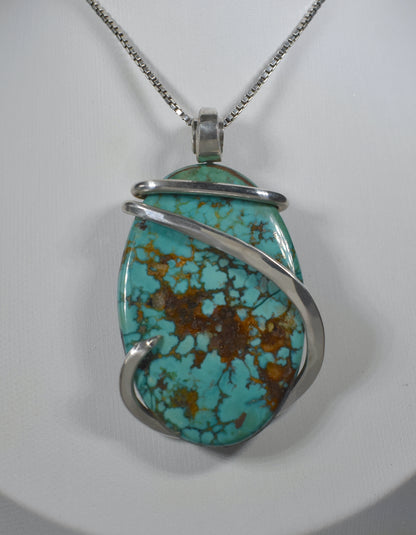 Tyrone Turquoise Handmade Stone Pendant Wrapped in Silver