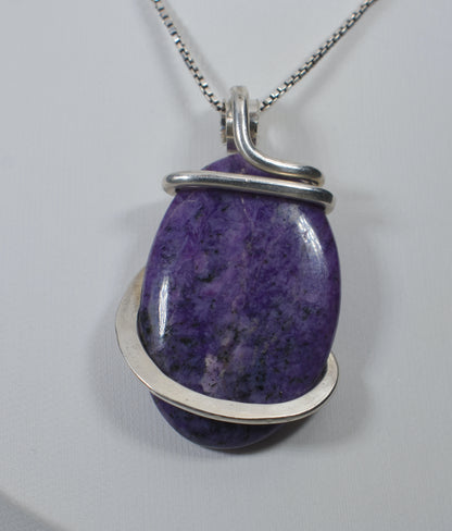 Sugilite Handmade Crystal Pendant Wrapped in Silver