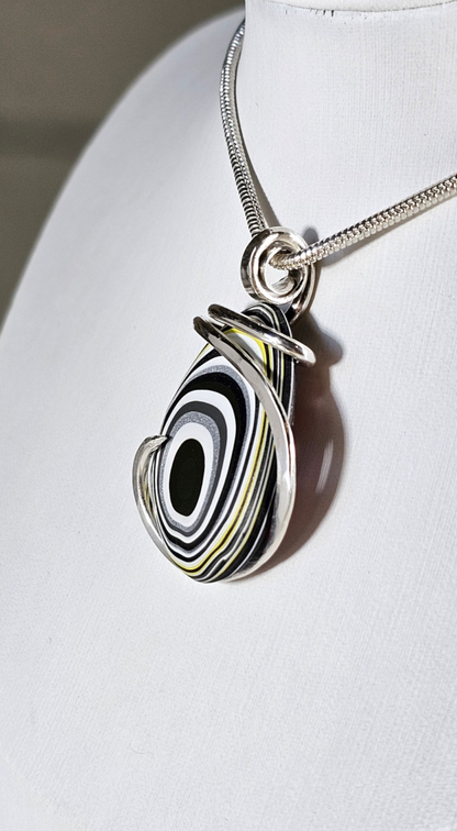 Fordite Handmade Stone Pendant Wrapped in Silver